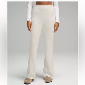 Lululemon ribbed soft stream pants, size 2, color bone. Never worn!!